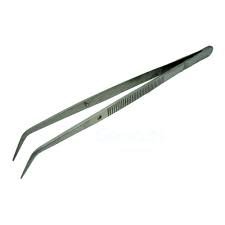 Close up of metal scraper blade removing glue